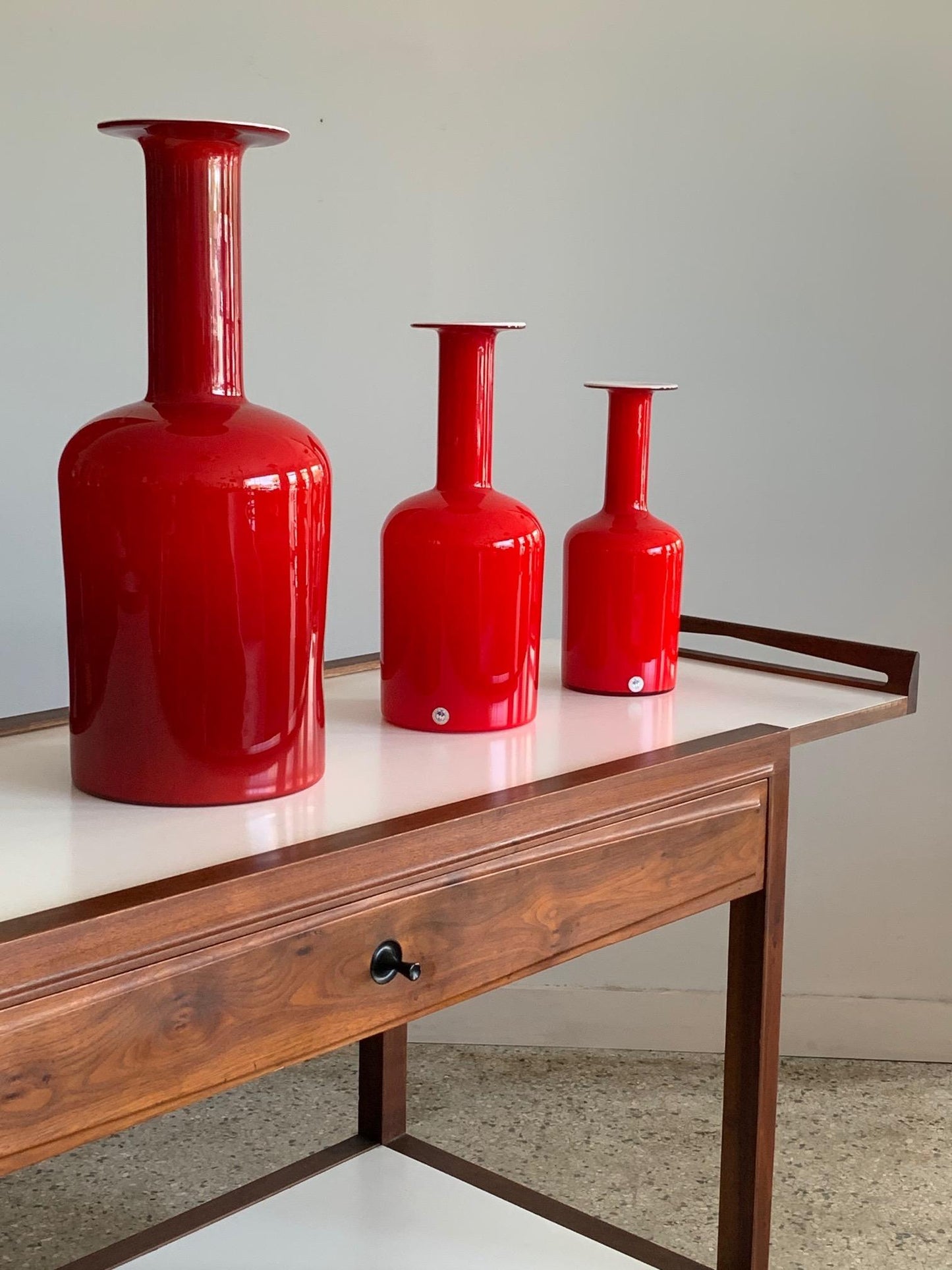 Frisman Vintage Group of Three Red Otto Bauer Holmegaard Bottles