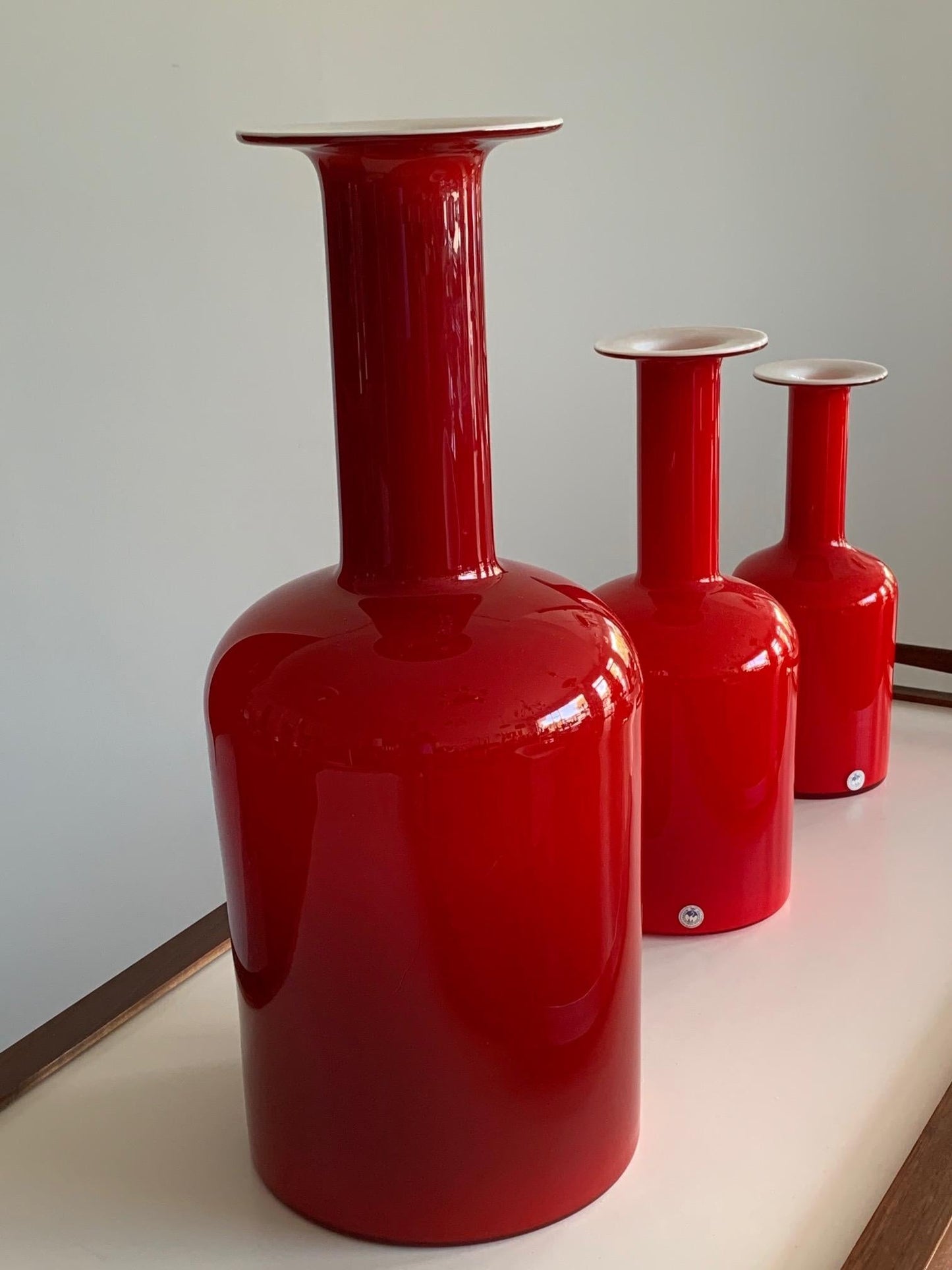 Frisman Vintage Group of Three Red Otto Bauer Holmegaard Bottles