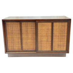 A Classic Mid Century Credenza With Sliding Caned Doors