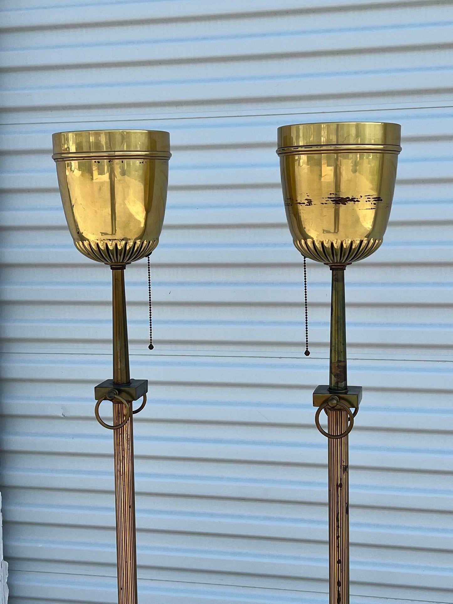 A Pair of Brass Torcheres Ca' 1950's