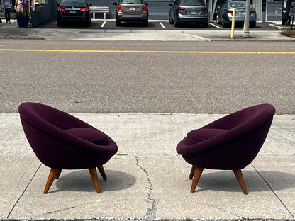 A Pair of Little Egg Chairs In The Style Of Royere