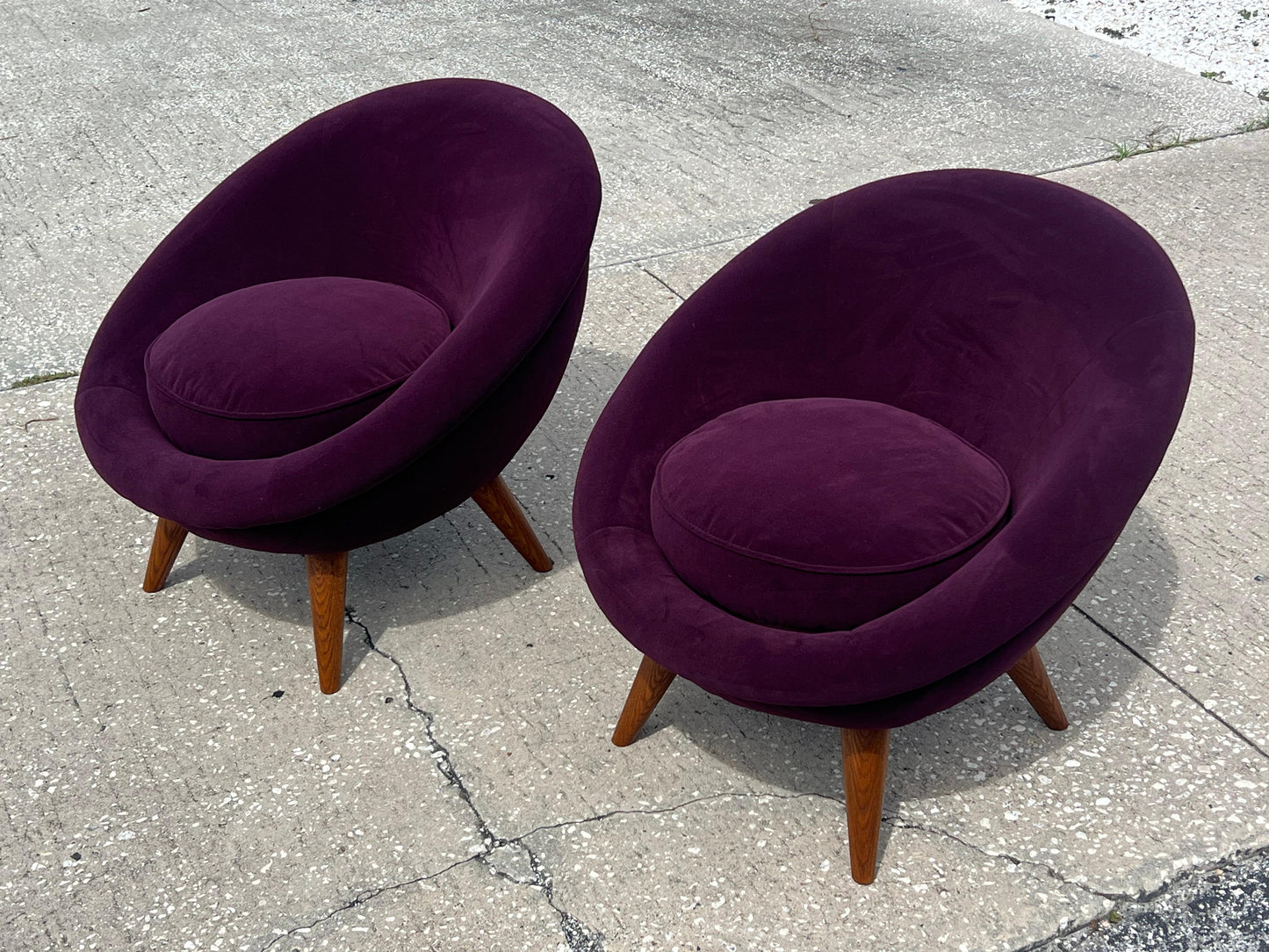 A Pair of Little Egg Chairs In The Style Of Royere