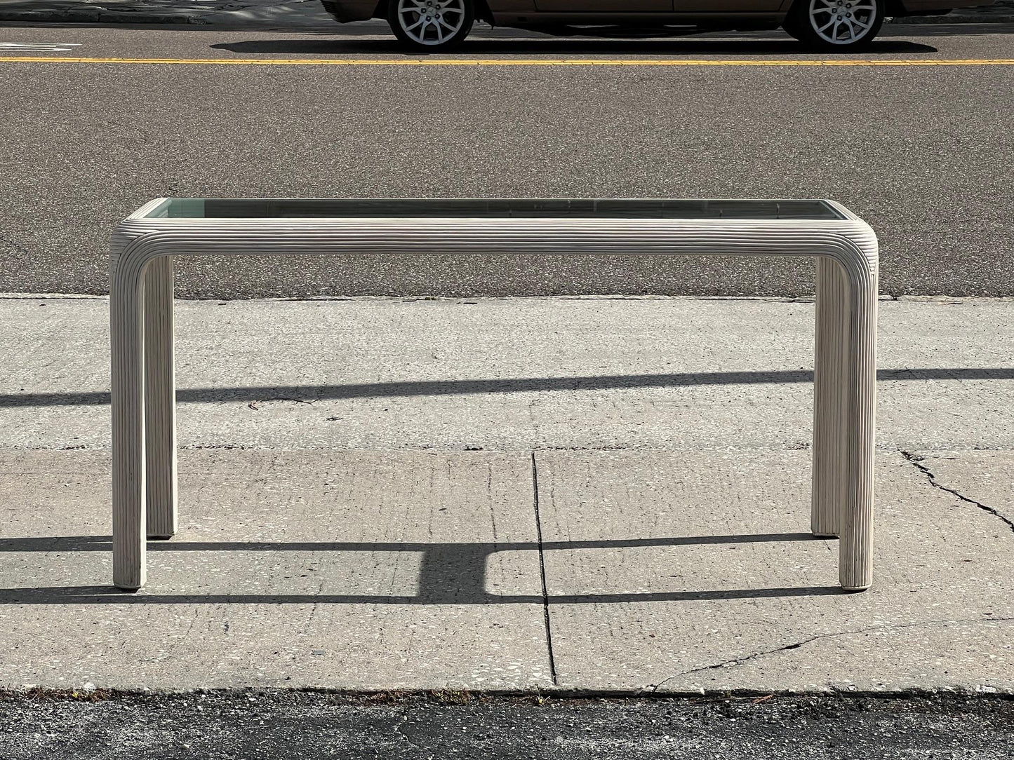 Pencil Reed Console Table By Sandtown Furnishings