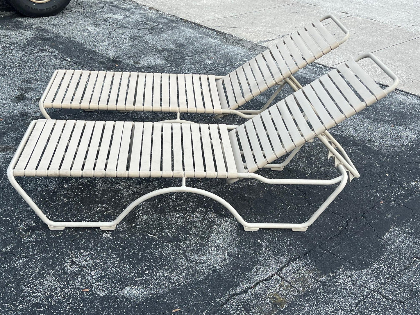 A Pair Of Aluminum Outdoor Chaises By Tropitone With Cushions