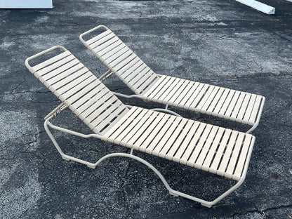 A Pair Of Aluminum Outdoor Chaises By Tropitone With Cushions