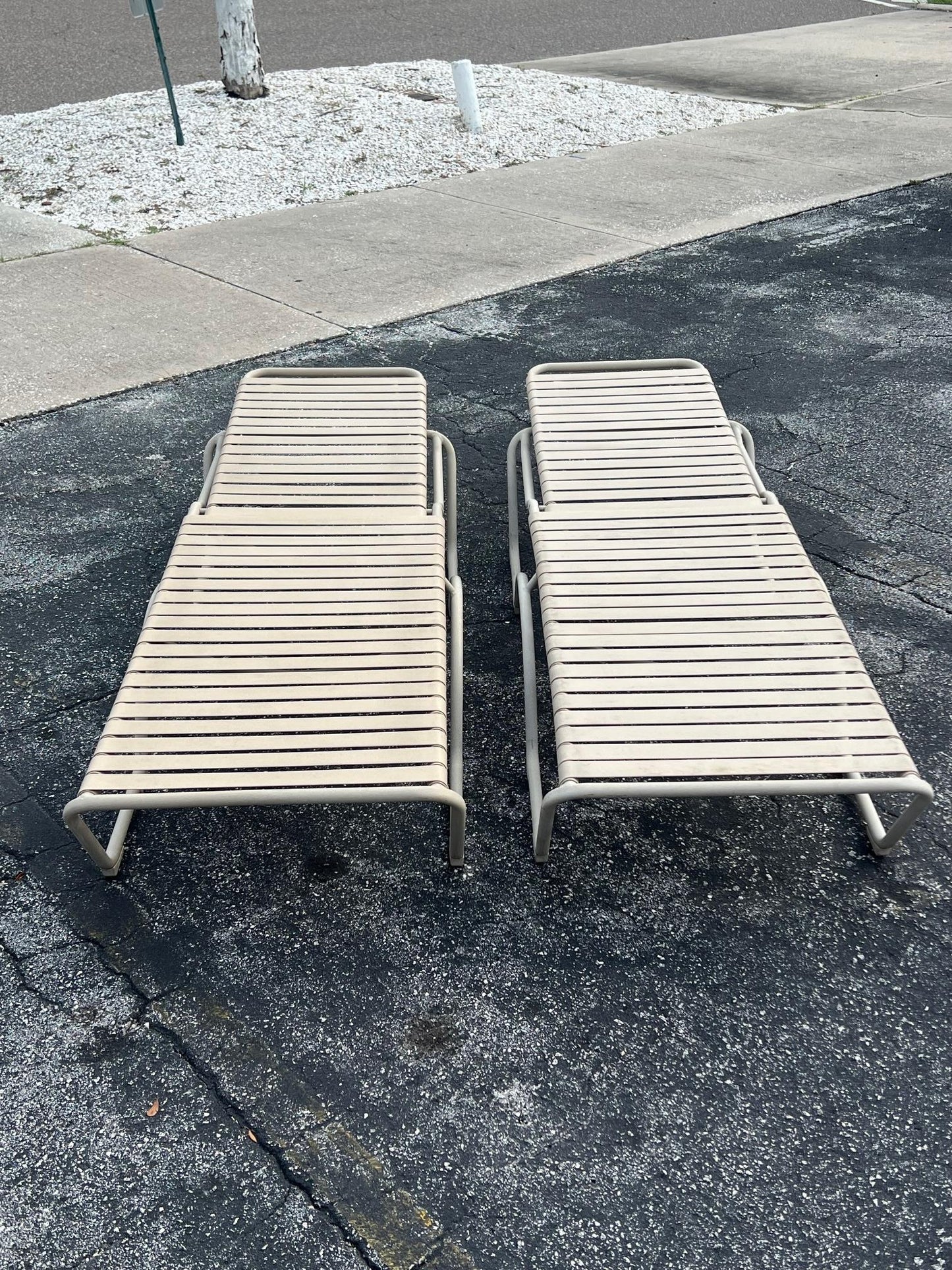 A Pair Of Aluminum Outdoor Chaises By Tropitone With Cushions