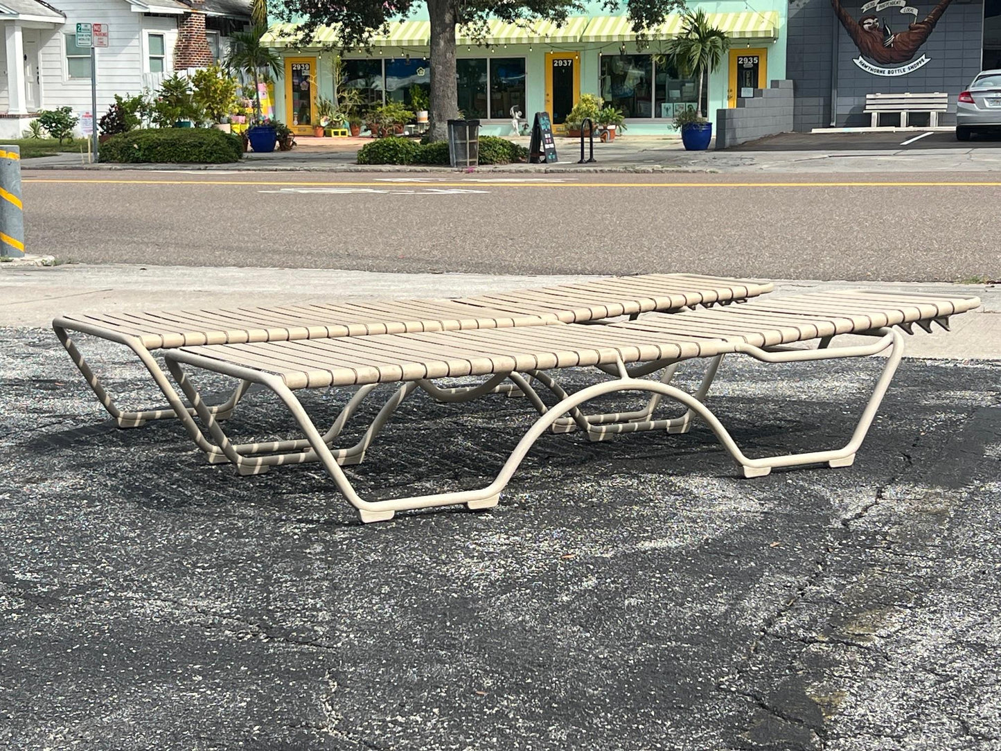 A Pair Of Aluminum Outdoor Chaises By Tropitone With Cushions