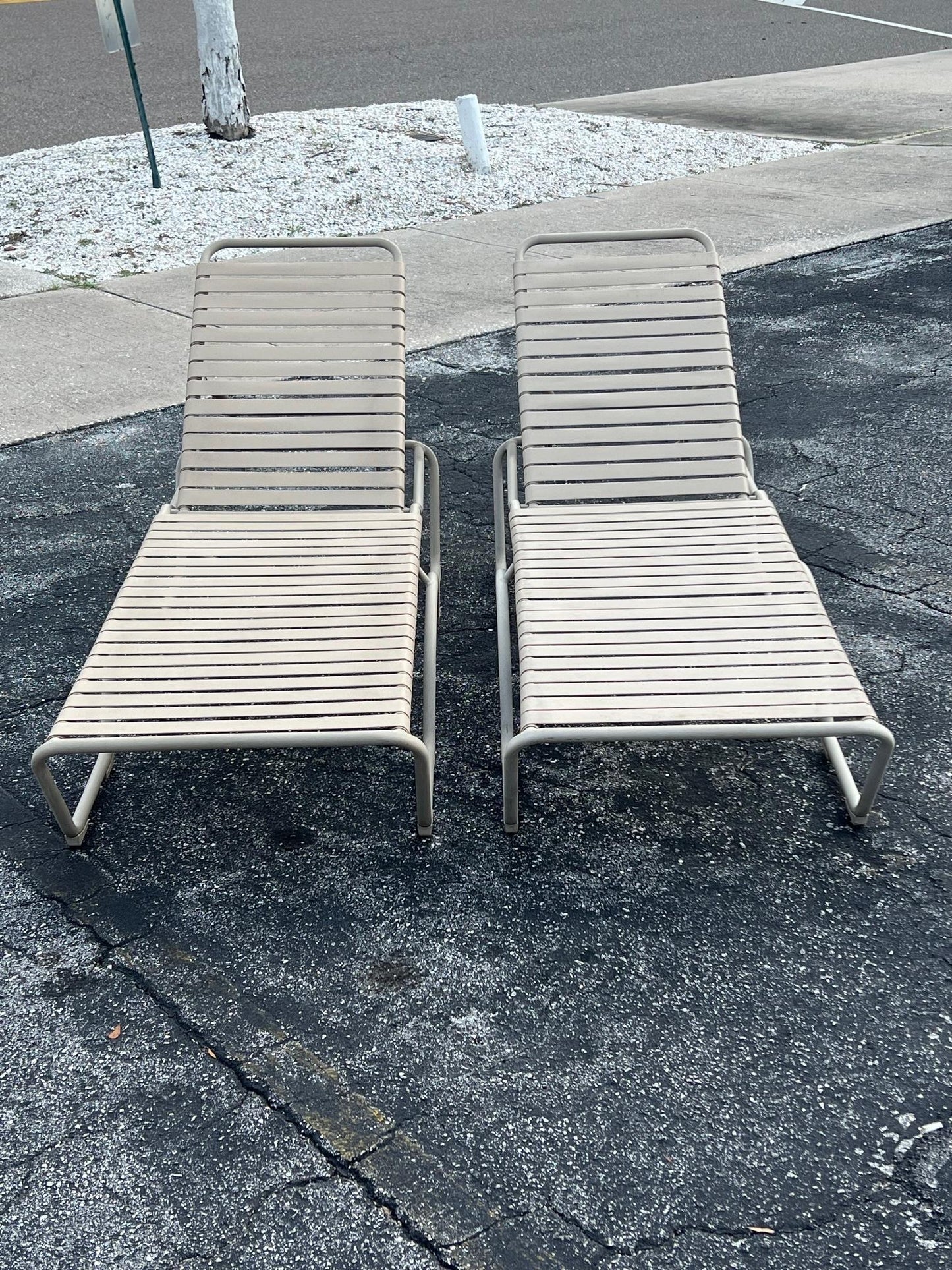 A Pair Of Aluminum Outdoor Chaises By Tropitone With Cushions