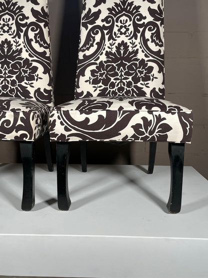 A Pair of Tall Upholstered Chairs