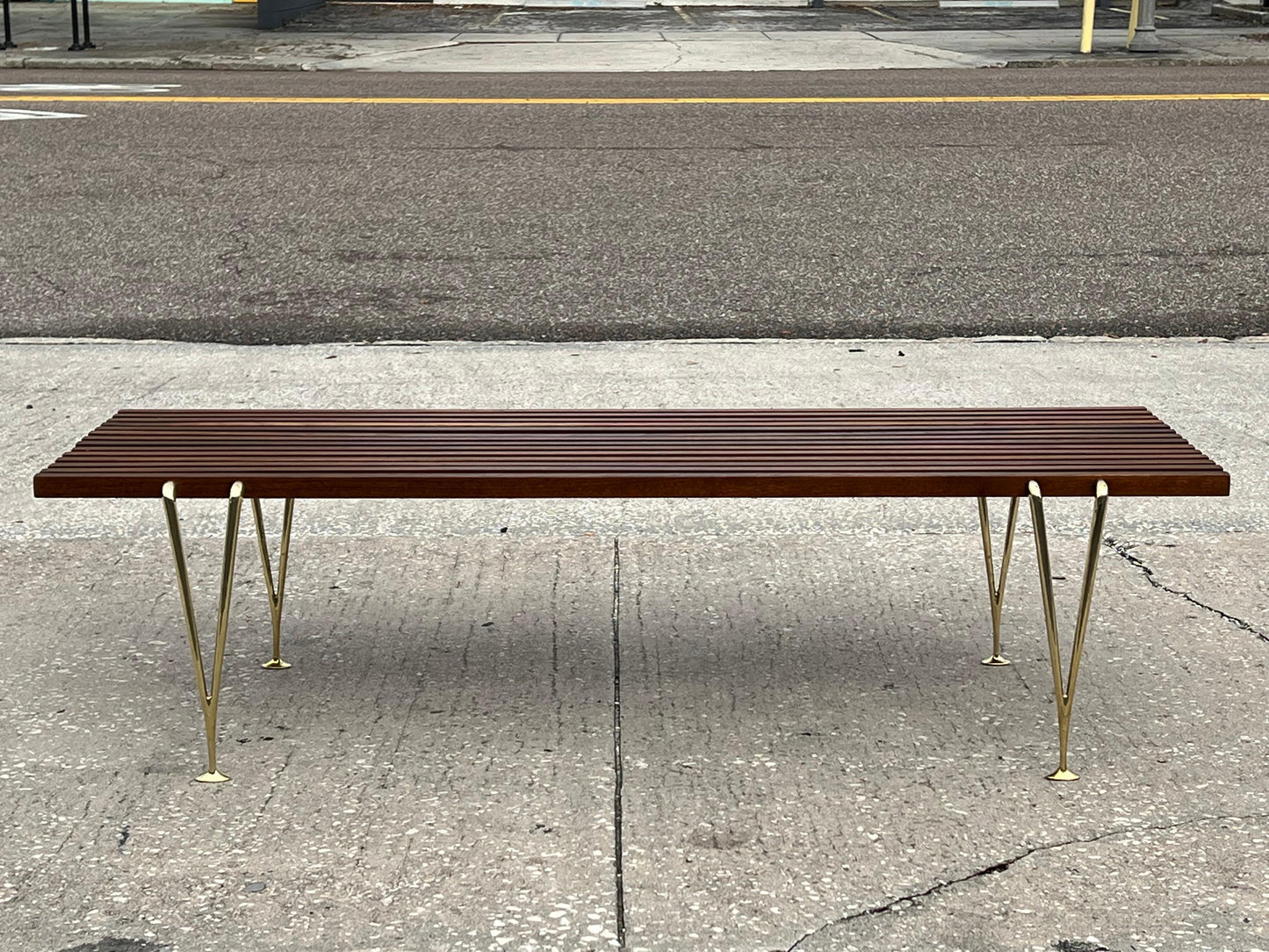 A Classic Hugh Acton Slat Bench With Solid Brass Legs ca' 1950's