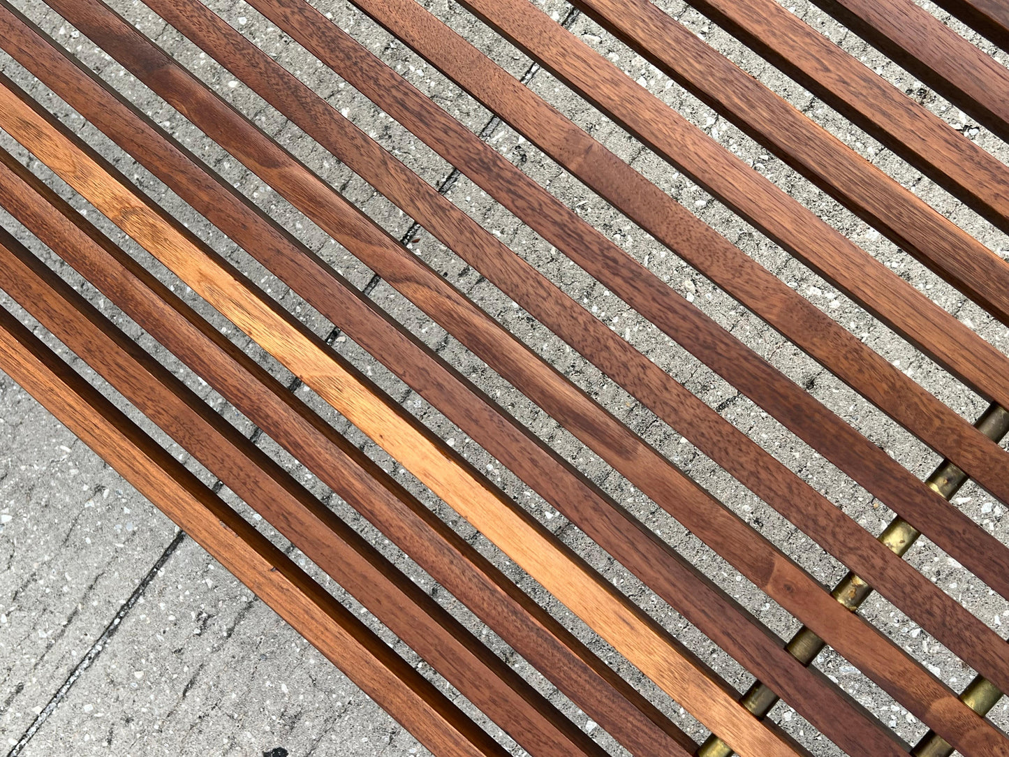 A Classic Hugh Acton Slat Bench With Solid Brass Legs ca' 1950's