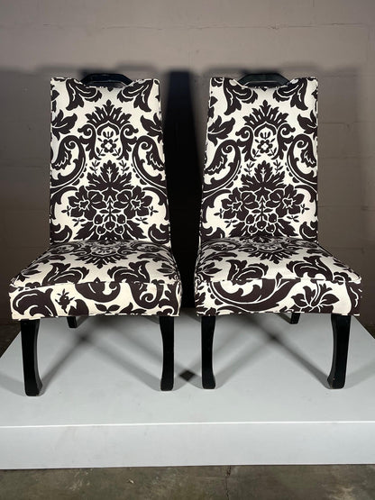 A Pair of Tall Upholstered Chairs