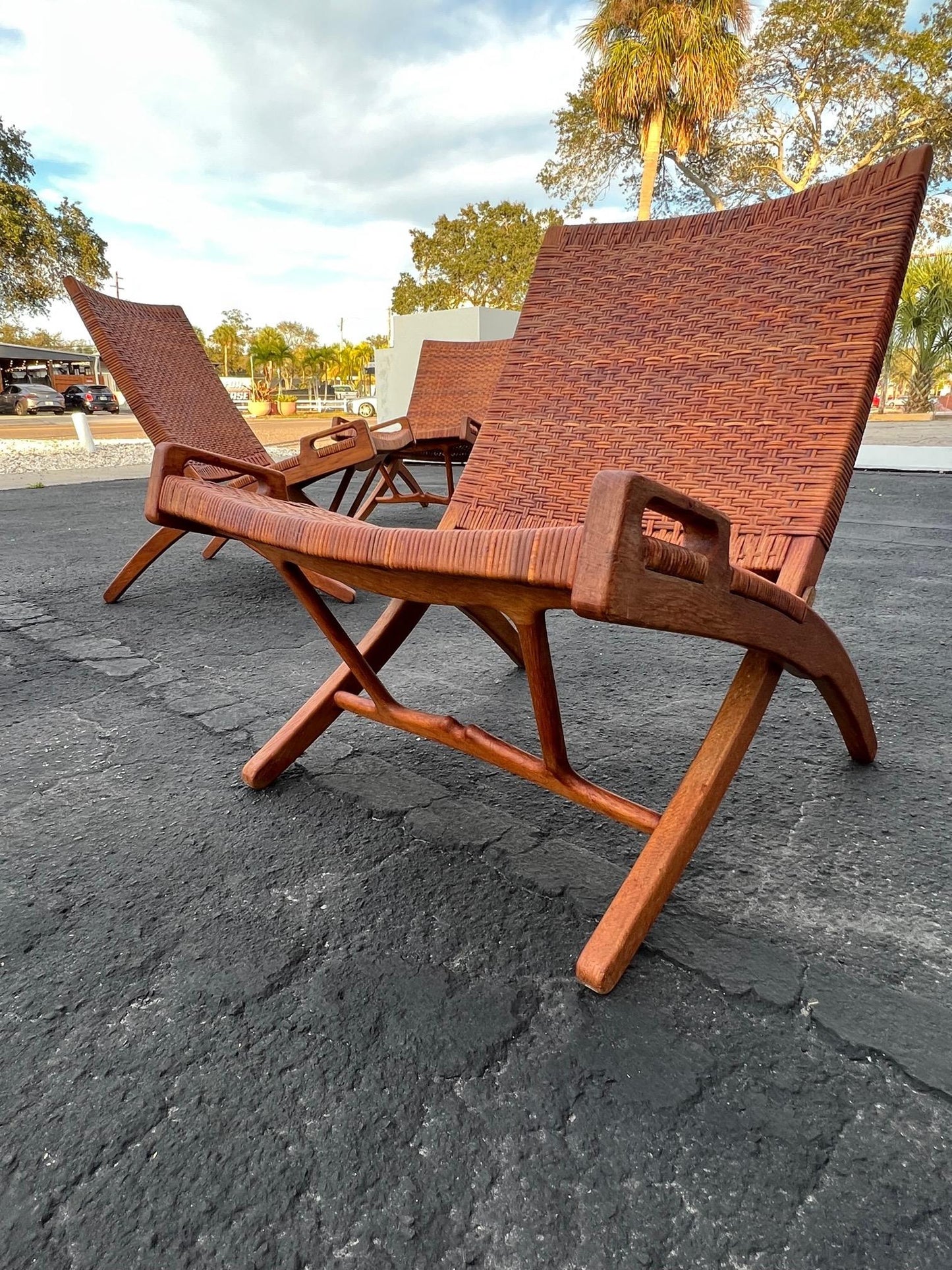 A Set Of Four Hans Wegner Folding Chairs