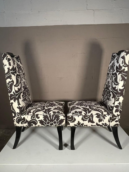 A Pair of Tall Upholstered Chairs