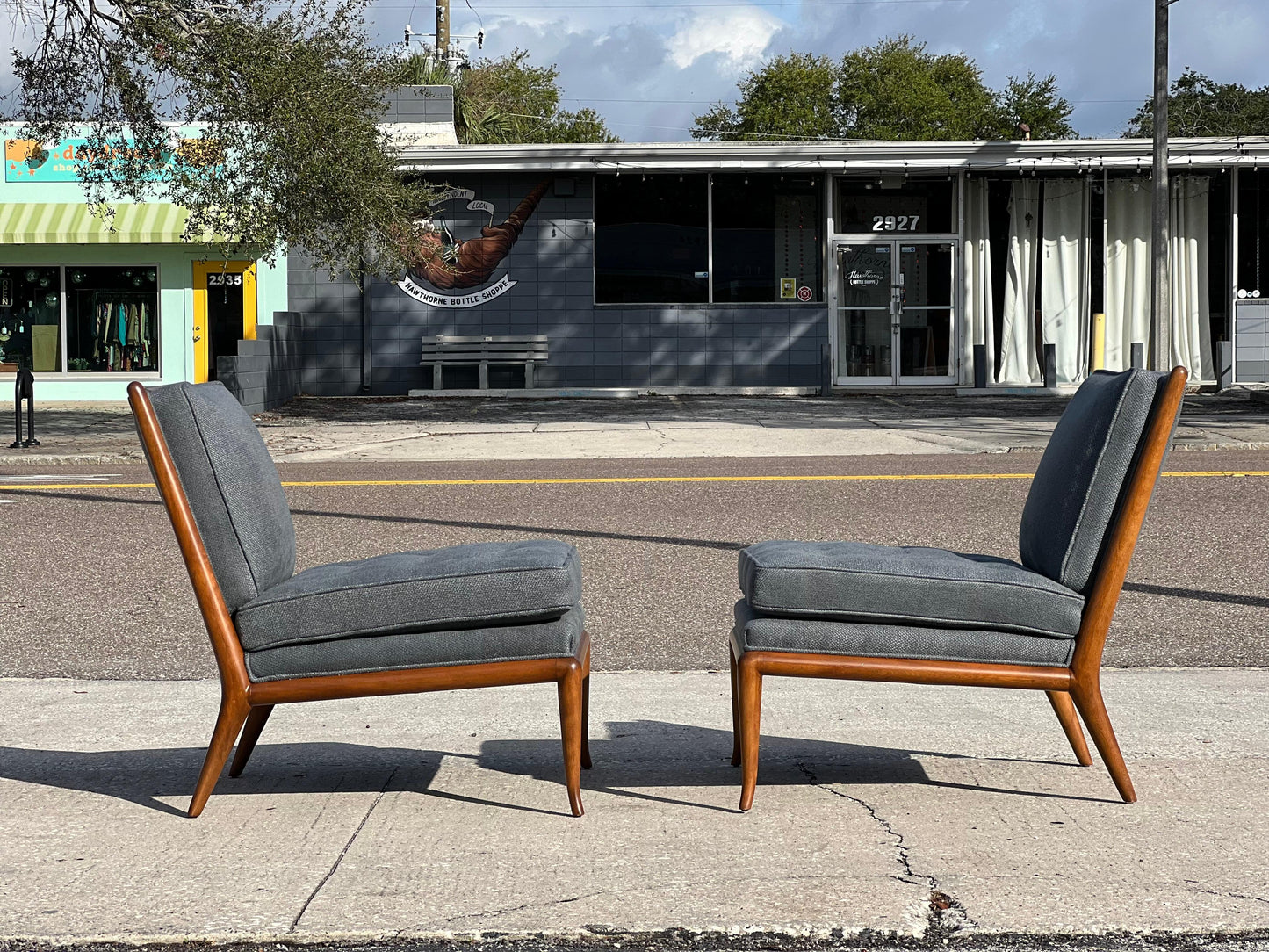 A Pair of T.H. Robsjohn-Gibbings Classic Slipper Chairs