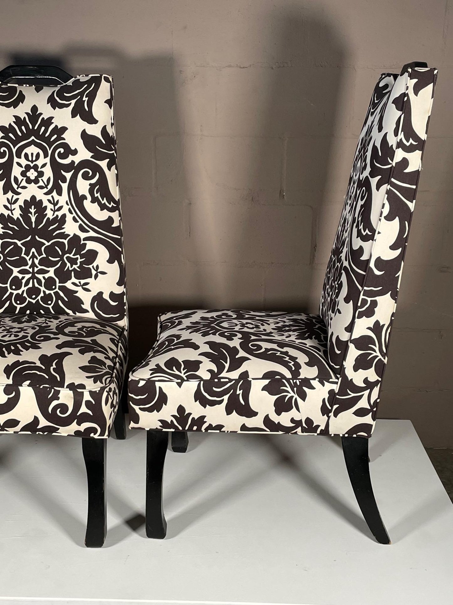 A Pair of Tall Upholstered Chairs