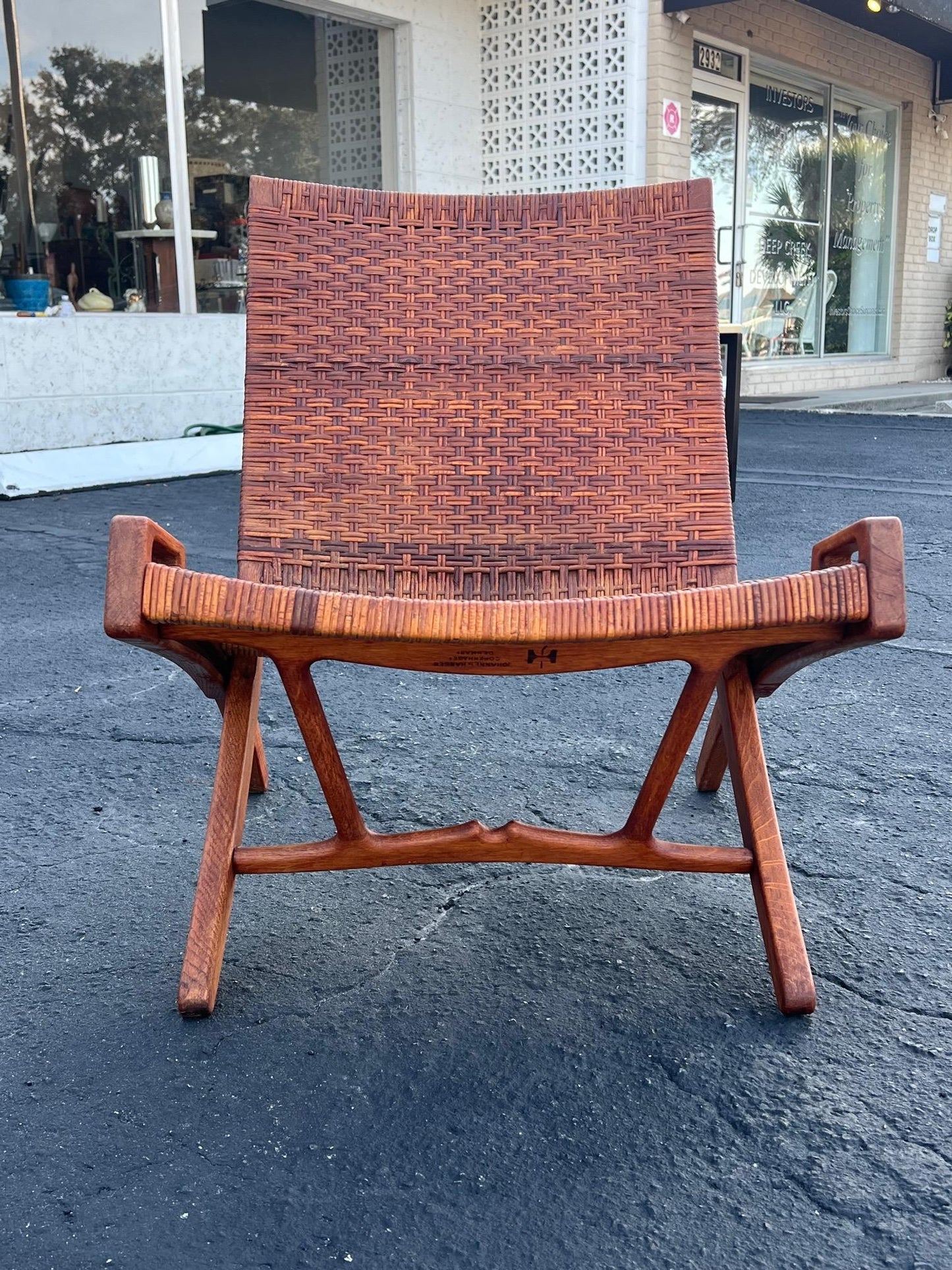 A Set Of Four Hans Wegner Folding Chairs