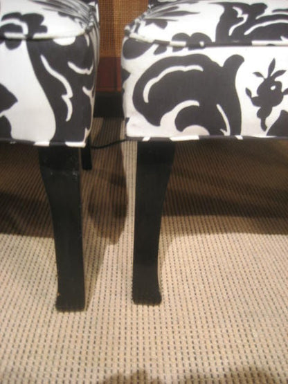 A Pair of Tall Upholstered Chairs