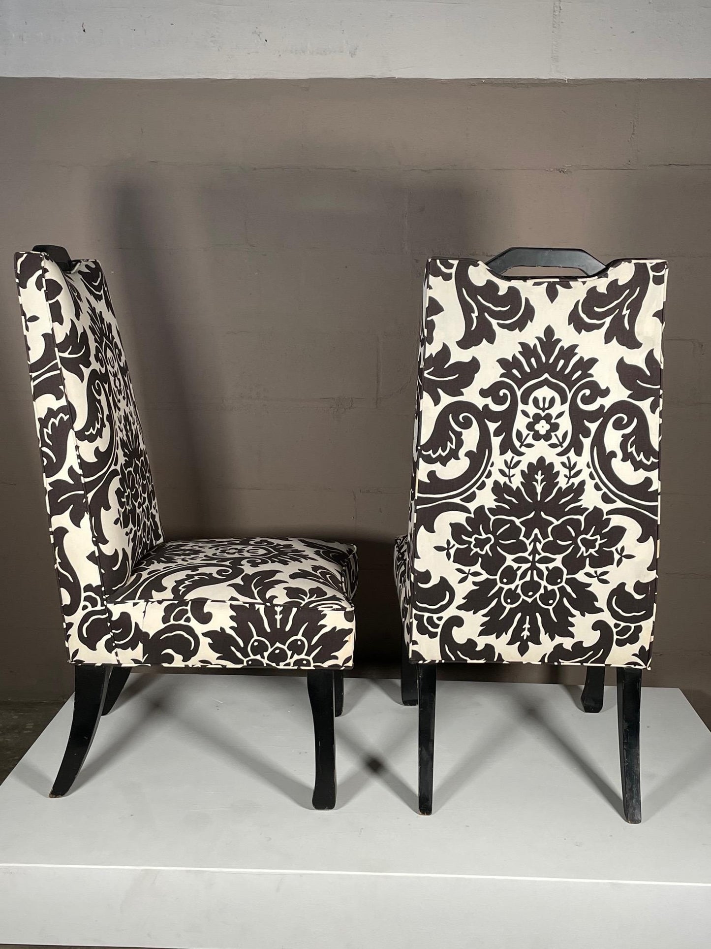 A Pair of Tall Upholstered Chairs