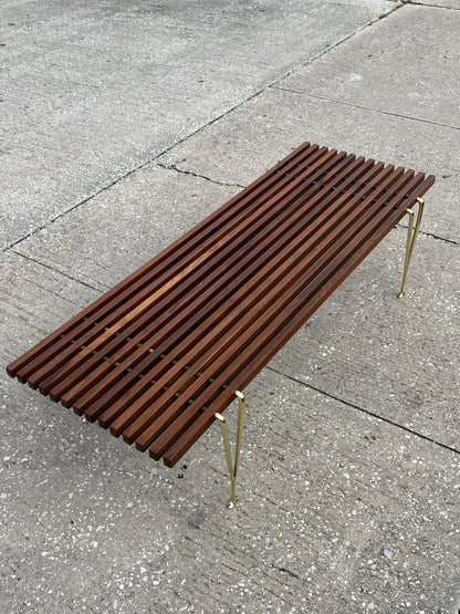 A Classic Hugh Acton Slat Bench With Solid Brass Legs ca' 1950's